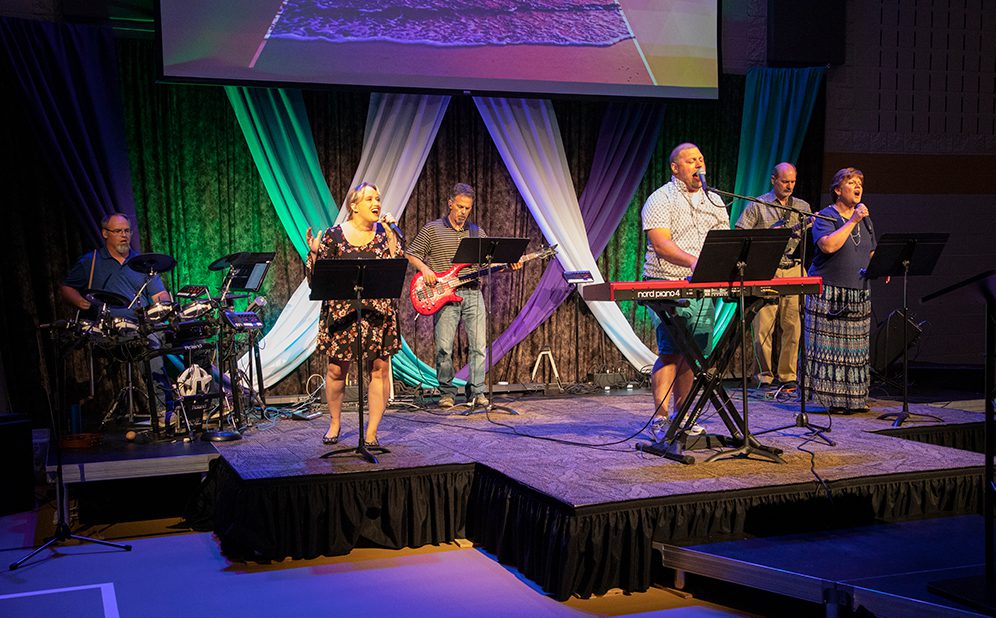 The worship band performing during a service.